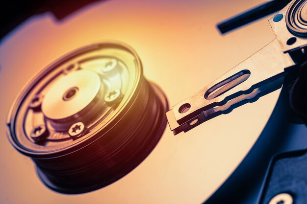 Spindle and plate open hard disk drive. Macro shot