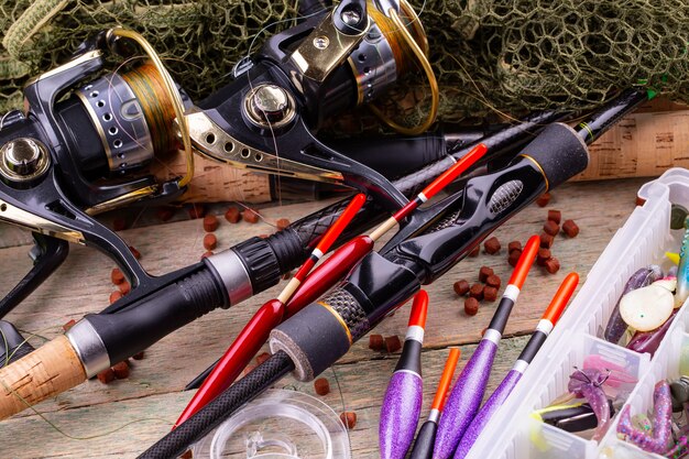 Photo spinning and fishing rods on an old table