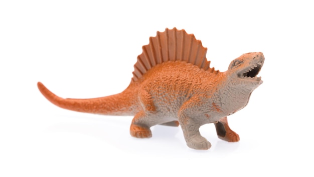 Foto spinosaurus gemaakt van plastic. dinosaurus speelgoed geïsoleerd op een witte achtergrond