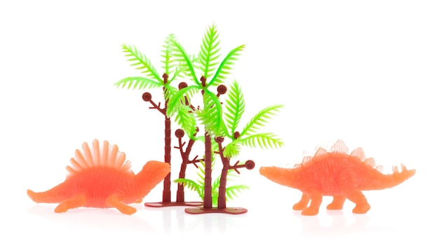 Photo spinosaurus made out of plastic. dinosaur toy isolated on white background