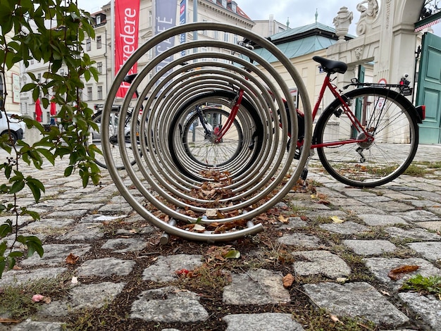 Spiral bike rack with a bicycle parked in the city