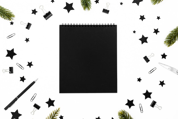 Spiral empty white notepad on festive christmas background. 