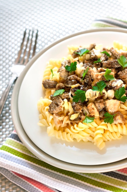 Spiral pasta with morel mushrooms