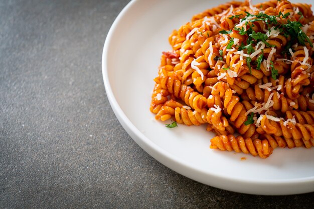 spiral or spirali pasta with tomato sauce and cheese