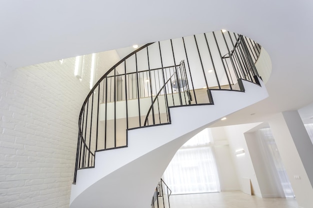 Spiral staircase in bright interior