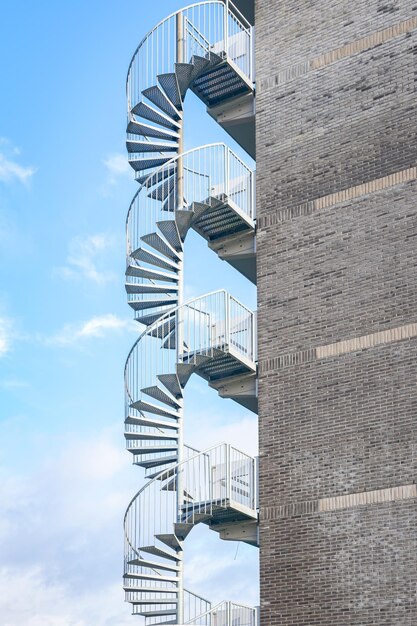 Spiral staircase on the edge of an apartment building