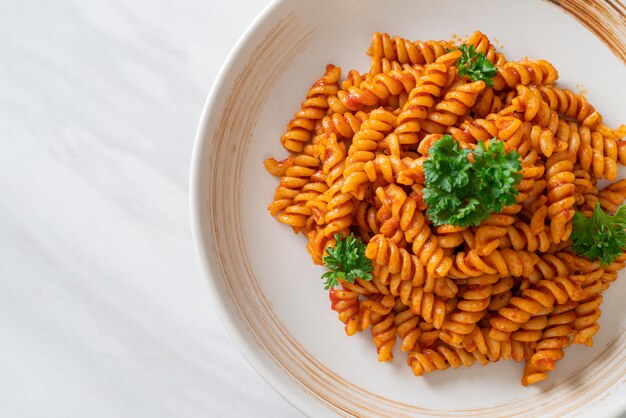 Spirali pasta with tomato sauce and sausage