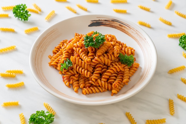 Spirali pasta with tomato sauce and sausage