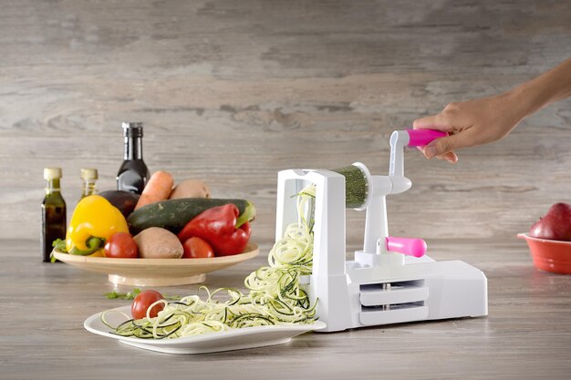 Spiralizing cucumber vegetable with spiralizer