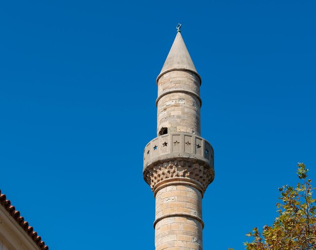 Spire of the defterdar mosque on the main square of kos town on the island of kos greece