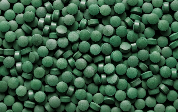 Spirulina pills background