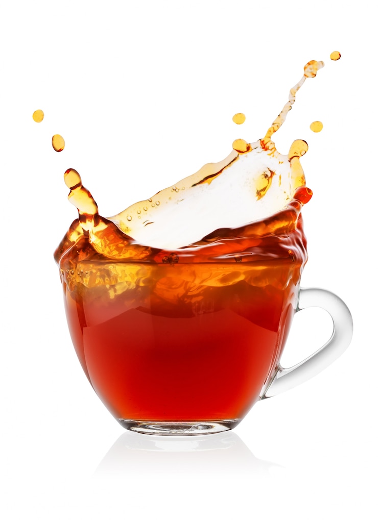 Photo splash in cup of black tea