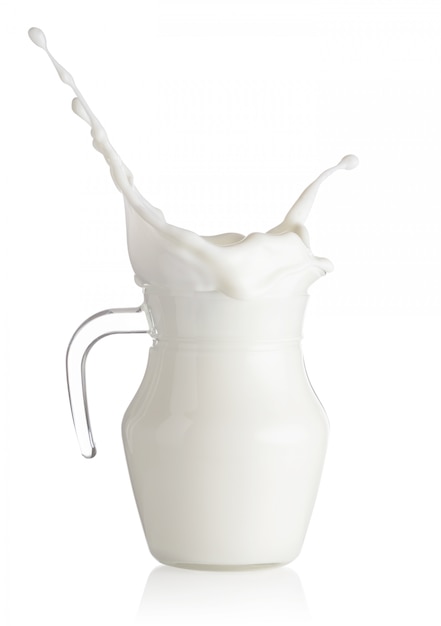 Splash in a glass decanter milk