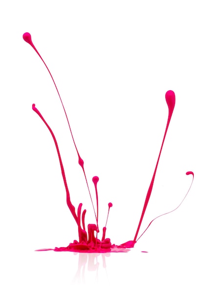 A splash of pink abstract paint on white background. Taken in Studio with a 5D mark III.