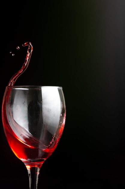 Splash of red wine on a black background