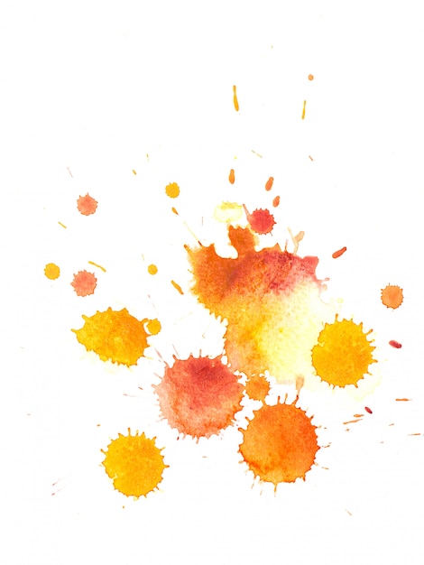 Splash van aquarel druppel op wit papier.