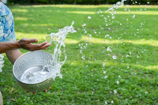 Splashing water during Songkran festivalThe Songkran festival is the traditional Thai New Year's