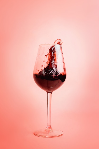 Splashing wine in a glass