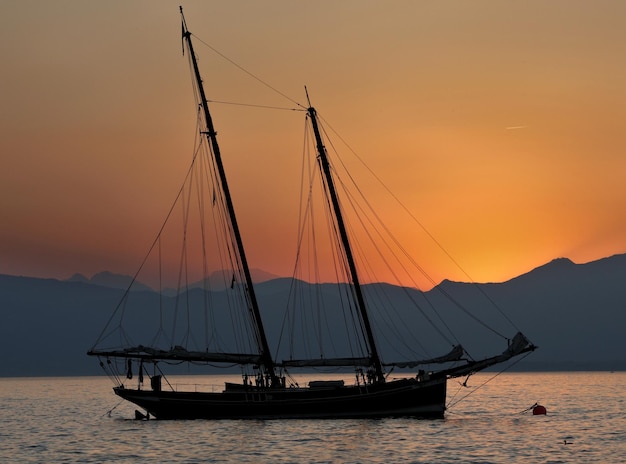 Splendid sailboat at sunset