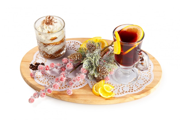 Sponge dessert in a glass and mulled wine