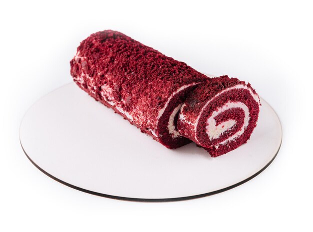 Sponge Swiss roll on white plate