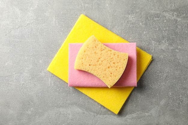 Sponges for washing dishes on grey