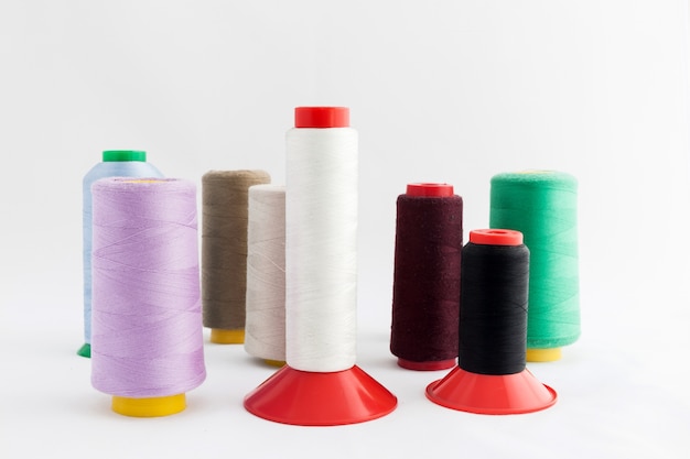 Spool of thread isolated on white background