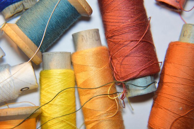 Spools of thread for sewing clothes closeup