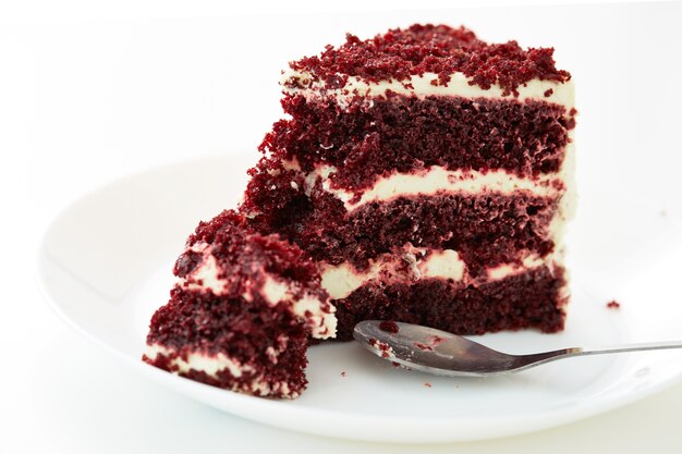 spoon cutting a red dessert