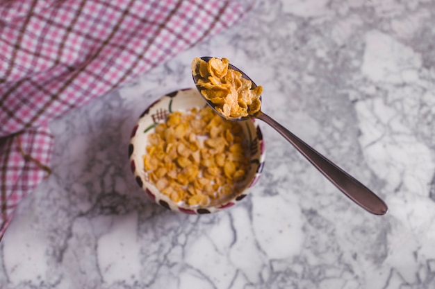 Spoon floating over breakfast