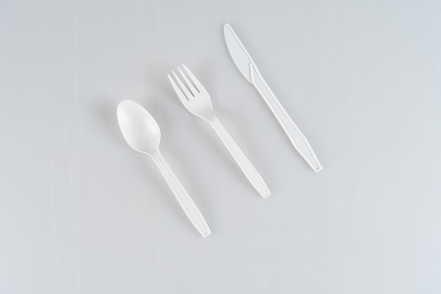 Spoon, fork and knife isolated on a white background.