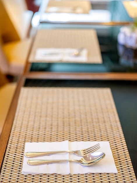 Spoon and fork organized on the table during breakfast located in Bandung, Indonesia