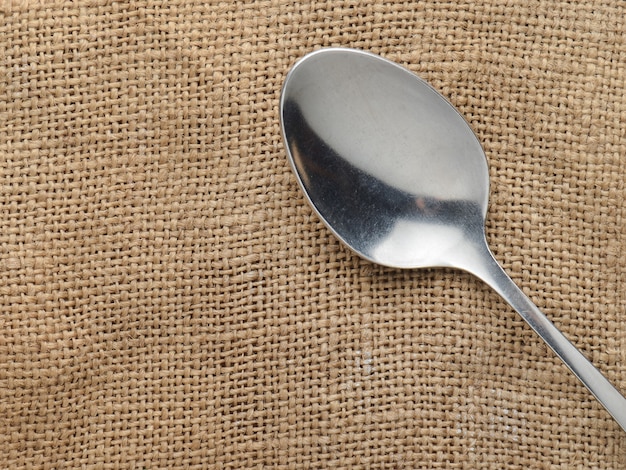 Spoon on a napkin from a baggie. Top view. Cutlery.