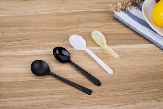 a spoon and spoon are on a table with a box of oats