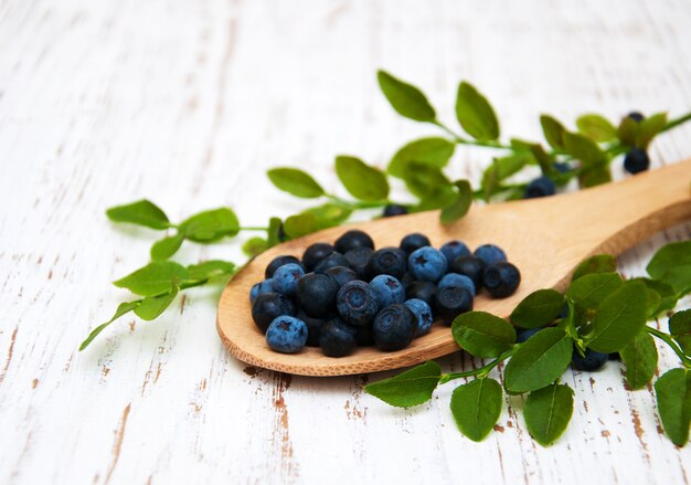 Spoon with Blueberries on a table