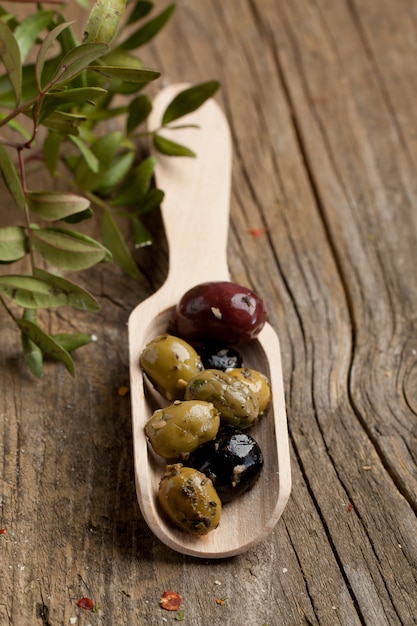 Spoon with olives