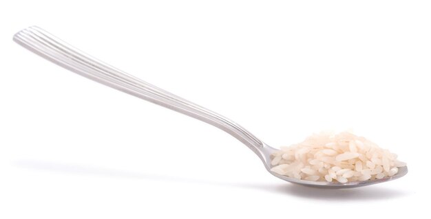 Spoon with rice isolated