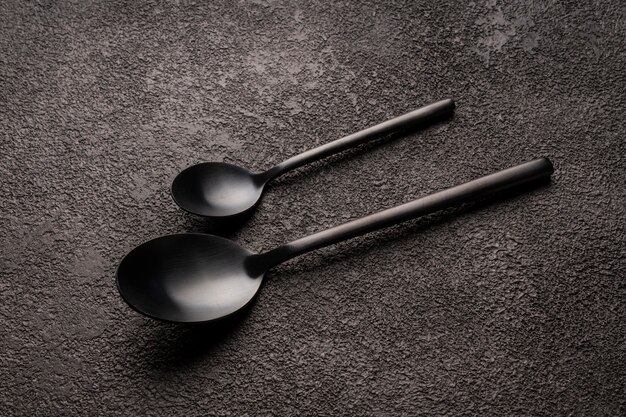 Spoons on a dark table