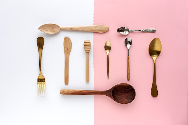 Spoons and forks on colors