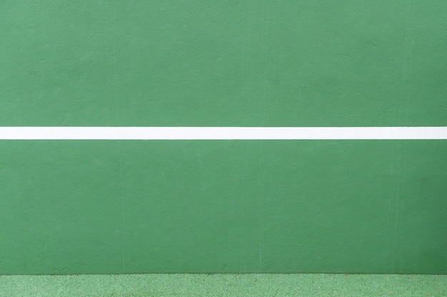 Sport achtergrond. groene muur en witte lijn