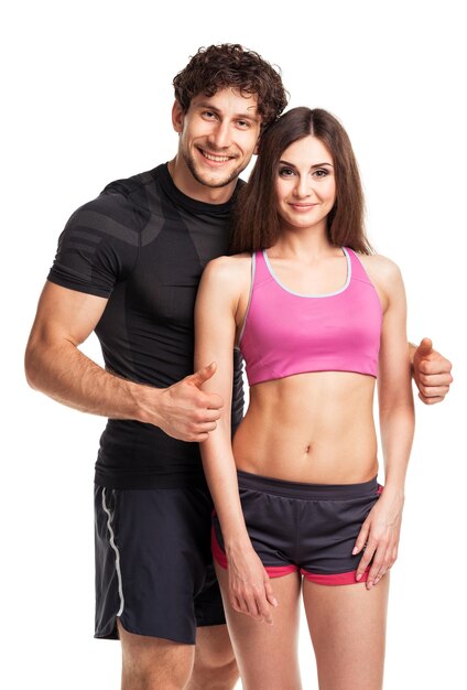 Sport couple man and woman after fitness exercise on the white background