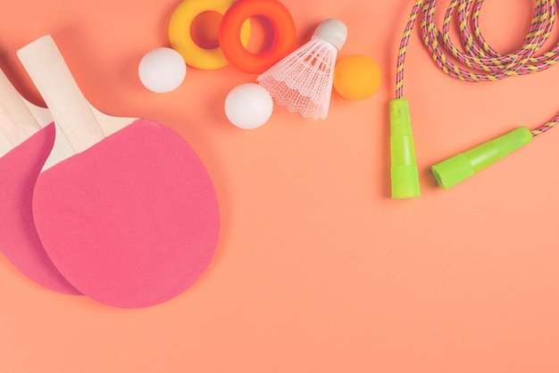 Sport equipment on orange background