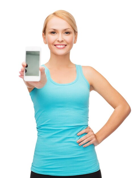 sport, excercise, technology, internet and healthcare - sporty woman with blank smartphone screen