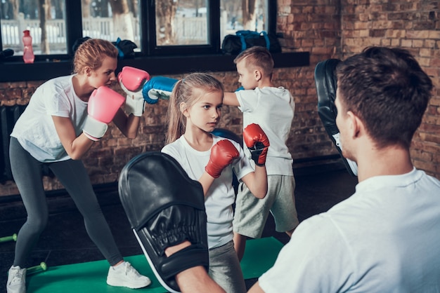 Sport Family Have Boxing Training In Fitness Club