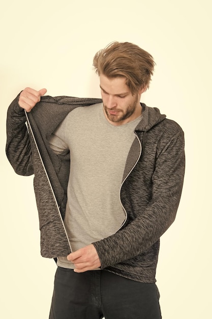 sport and fashion fashion model isolated on white man in grey jersey athletic man in sportswear guy with beard and stylish hair