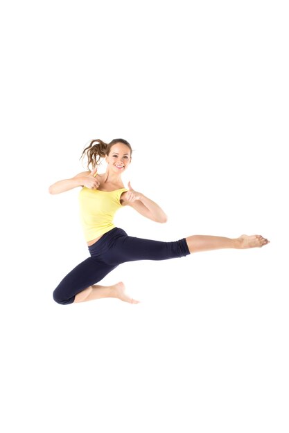 sport girl jumping isolated on white background. fitness and healthy lifestyle.