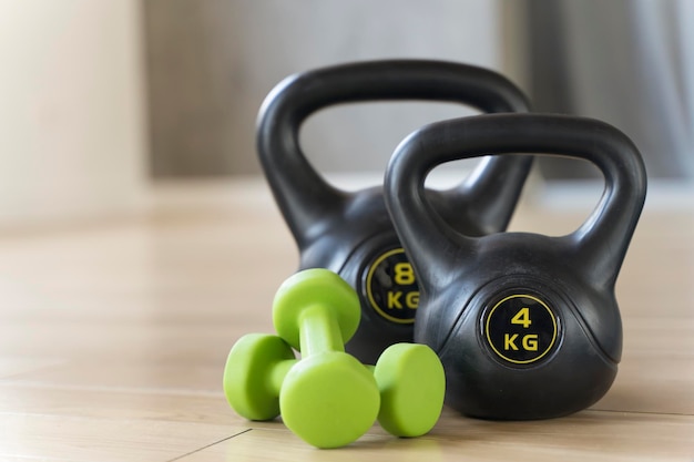 Sport gym background dumbbells and fitness equipment in the gym\
healthy lifestyle aerobics