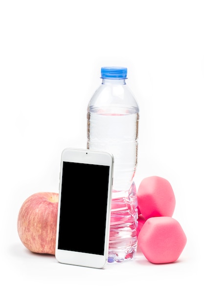 sport, healthy lifestyle and objects concept - close up of dumbbells, fitness tracker, earphones and water bottle over white background