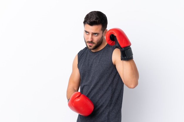 Sport man with beard over isolated wall