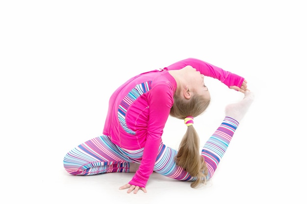 Sport and success. Child in pink sportswear. Workout of small girl isolated on white background. Education and energy. Fitness and health., sport